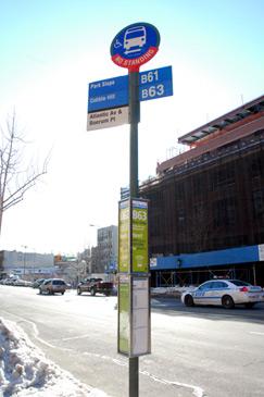 bus stop pole and guide-a-ride schedule box